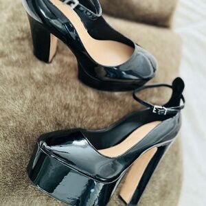 Brand new Shultz patent leather platforms